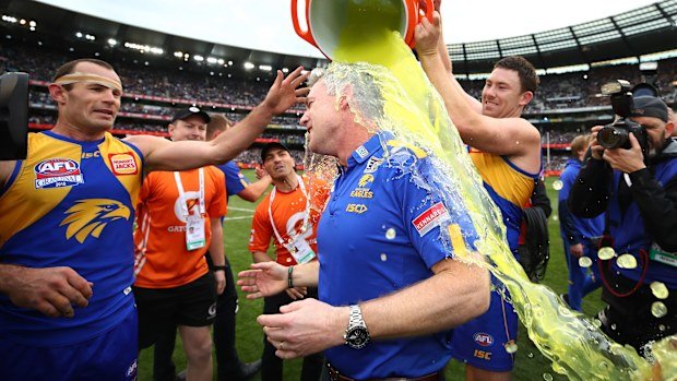 McGovern dousing coach Adam Simpson with Gatorade following the 2018 grand final.