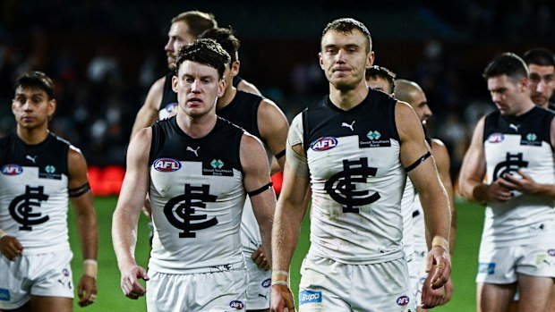 Patrick Cripps (right) and Sam Walsh.