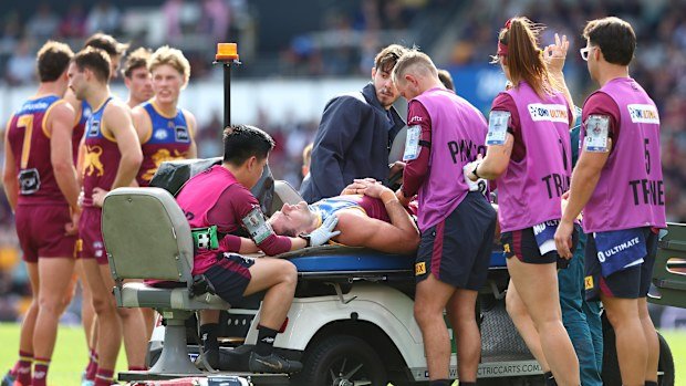 Jack Payne of the Lions is injured during the round 14 AFL match between Brisbane Lions and Greater Western Sydney Giants at The Gabba, on June 14, 2025, in Brisbane, Australia. (Photo by Chris Hyde/AFL Photos/via Getty Images)