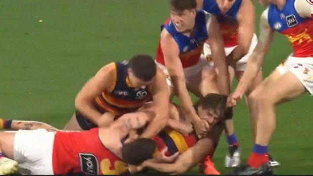 Brawl erupts following James Peatling's reckless tackle on Lachie Neale.