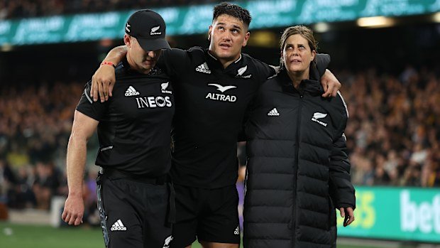 Quinn Tupaea of the All Blacks is injured at Marvel Stadium.