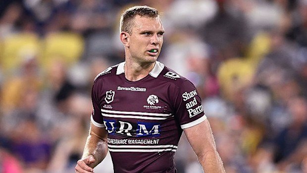 Tom Trbojevic of the Sea Eagles looks on.