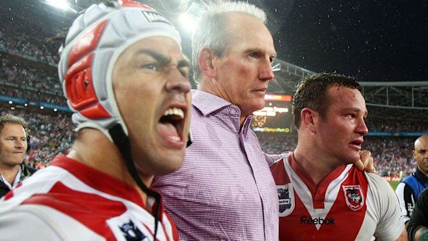 Wayne Bennett celebrates with Jamie Soward and Dean Young after the Dragons' 2010 NRL Premiership. (Getty)