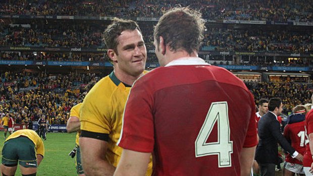 James Horwill and Alun Wyn Jones shake hands.