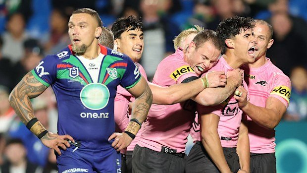 Blaize Talagi of the Panthers celebrates with teammates after scoring a try during the round 16 NRL match between the New Zealand Warriors and Penrith Panthers at Go Media Stadium on June 21, 2025, in Auckland, New Zealand. (Photo by Phil Walter/Getty Images)