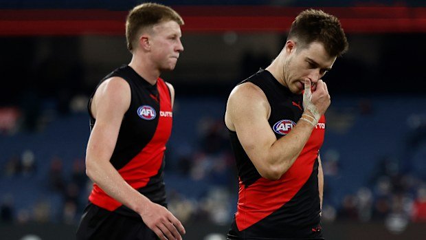 Zach Merrett of the Bombers looks dejected after a loss.