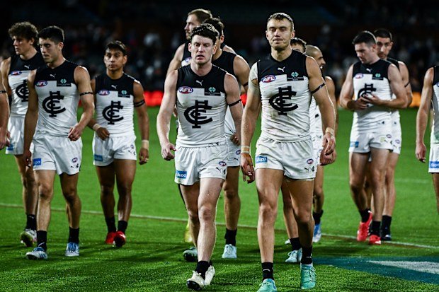 Patrick Cripps (right) and Sam Walsh.