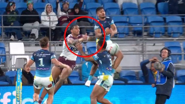 Jason Saab was penalised for this contact on Alofiana Khan-Pereira in the first half of the Sea Eagles' clash with the Titans on the Gold Coast.