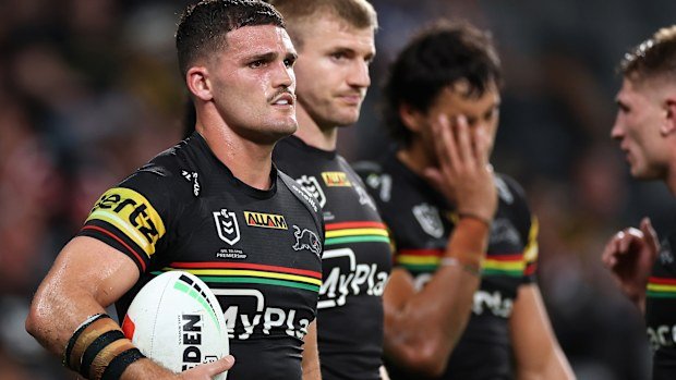 Nathan Cleary of the Panthers and team mates look on after loss.