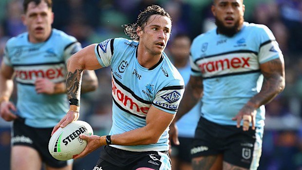 Nicho Hynes of the Sharks passes.