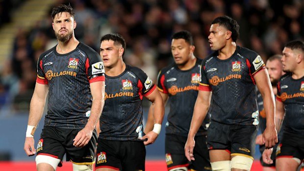The Chiefs look dejected after losing the 2024 Super Rugby Pacific grand final.