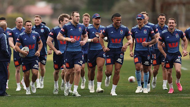 Blues players warming up during a training session for State of Origin at Blue Mountains Grammar School.