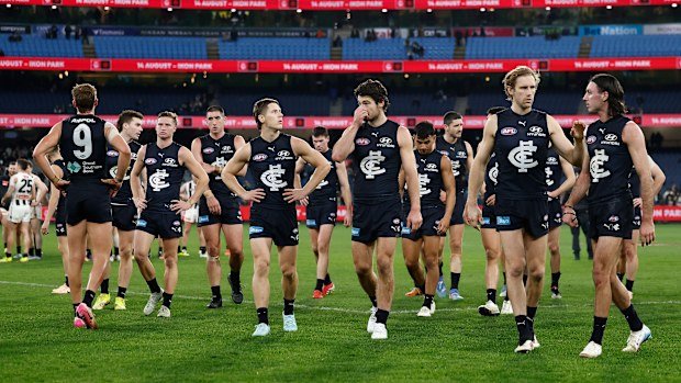 The Blues look dejected after a loss during the 2025 AFL Round 17 match between the Carlton Blues and the Collingwood Magpies at the Melbourne Cricket Ground on July 4, 2025 in Melbourne, Australia. (Photo by Michael Willson/AFL Photos via Getty Images)