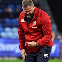 Andy Farrell checks the grass on the pitch.