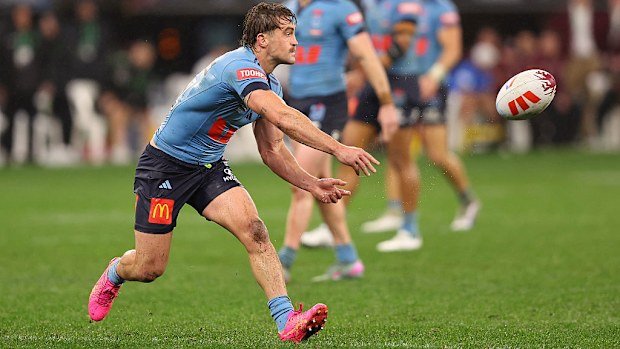 Connor Watson passes the ball during game two of the Men's State of Origin series.