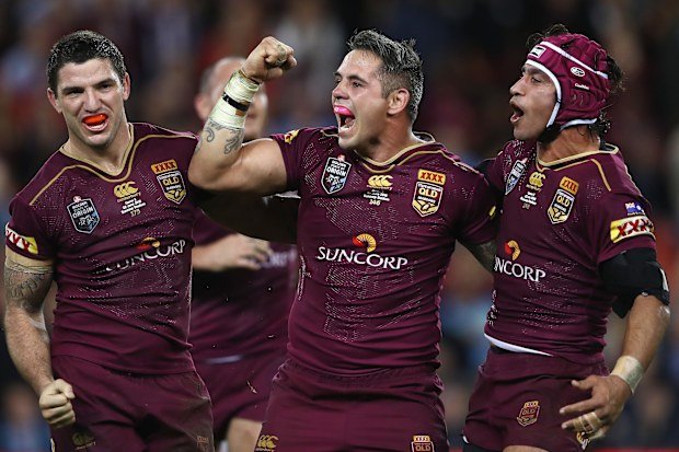 From left: Matt Gillett, Corey Parker and Johnathan Thurston celebrate Queensland's victory in game two of the 2016 State of Origin series.