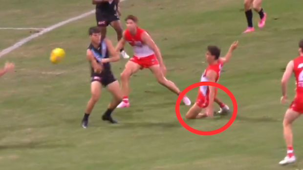 Sydney player slips on the SCG turf.