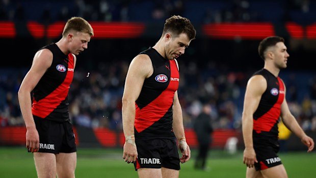 Zach Merrett of the Bombers looks dejected after a loss.