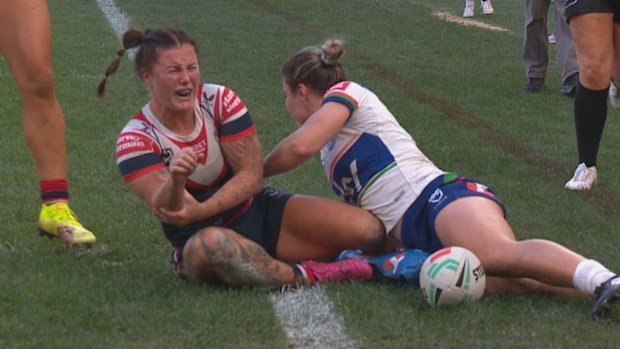 Roosters winger Jayme Fressard was assisted from the field after a suspected dislocated elbow against the Warriors.