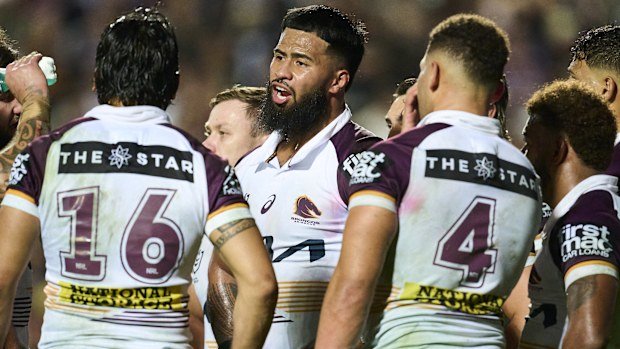 Broncos players react after conceding a try against Manly in round 13.